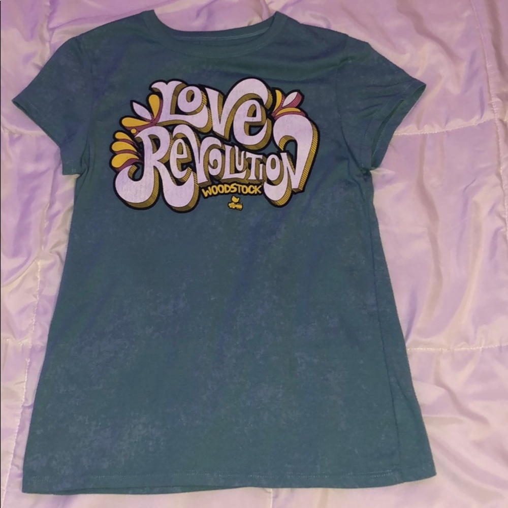 Small, Woodstock tee that says “Love revolution”